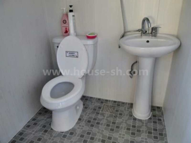 Shower and toilet container house